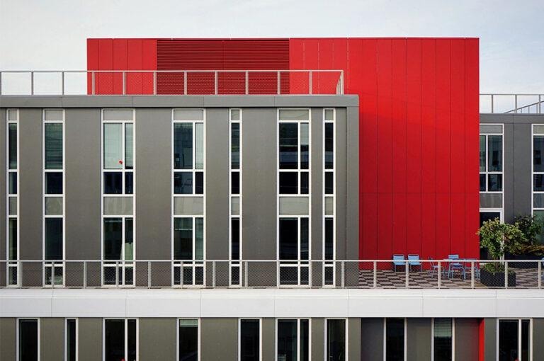 Modern commercial building with anti-corrosive coatings by Lee Decorating